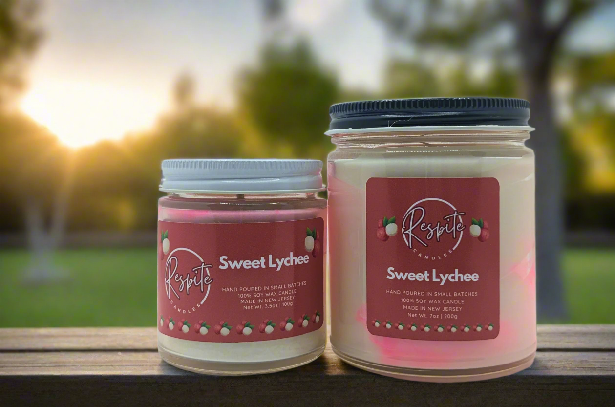Two candles labeled 'Sweet Lychee' by 'respite' on a light gray background