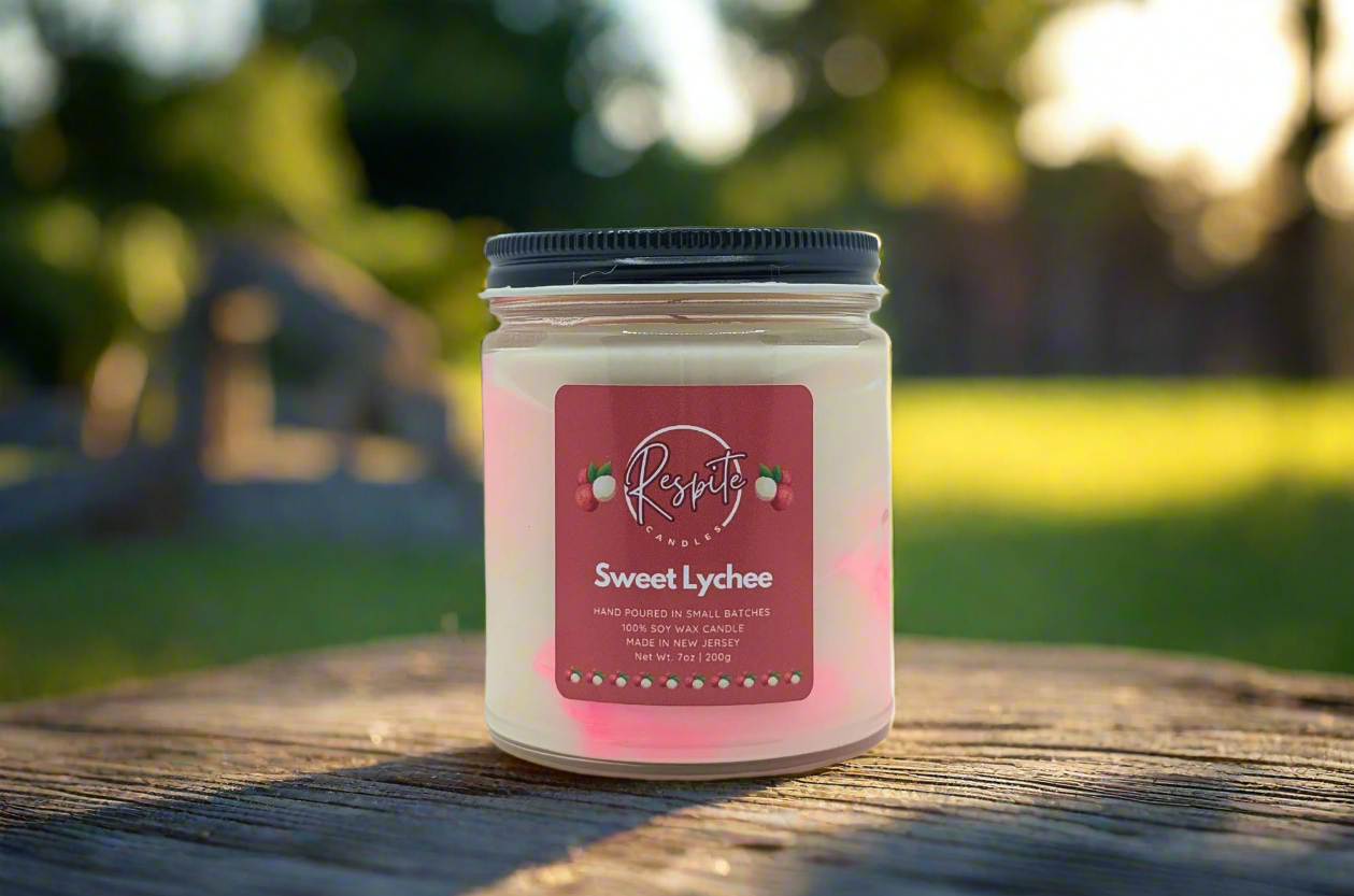 Candle with a red label on a light gray background