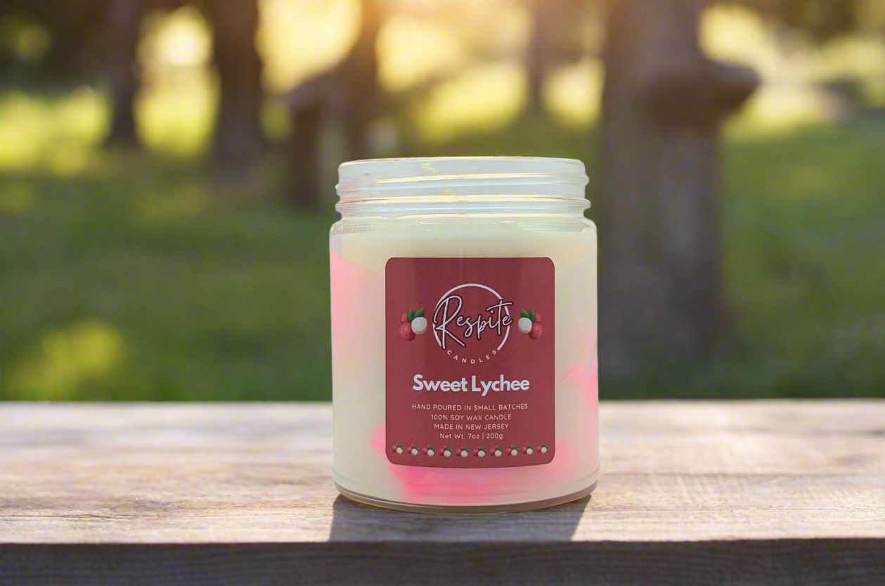 Candle with a 'Sweet Lychee' label on a white background