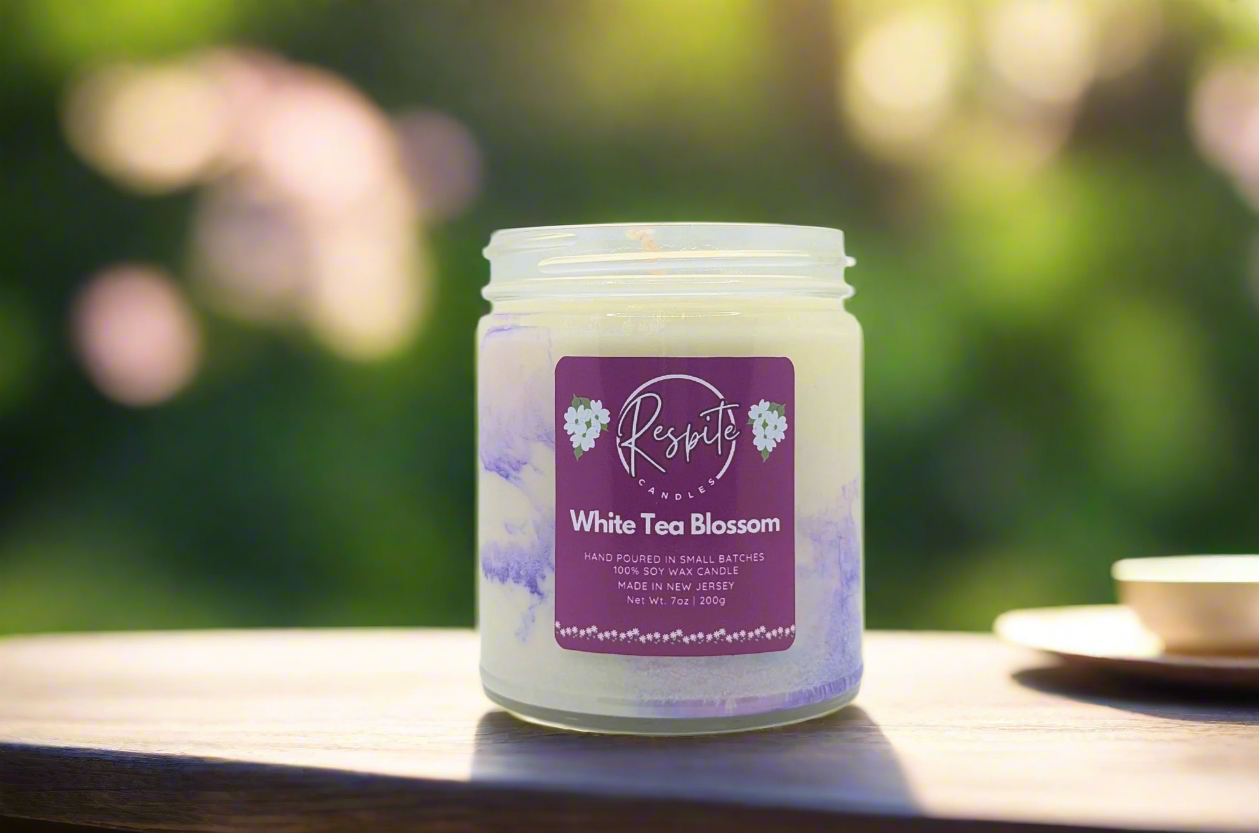 Candle with a purple label on a white background