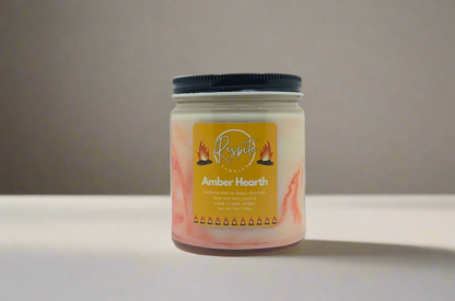 Candle jar with 'respite' brand label on a white background