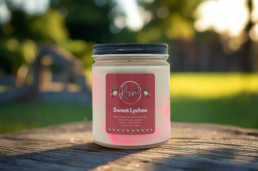 Candle with a red label on a light gray background